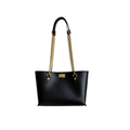 Black Hemingway leather tote bag with brass chain handles and solid brass hardware.